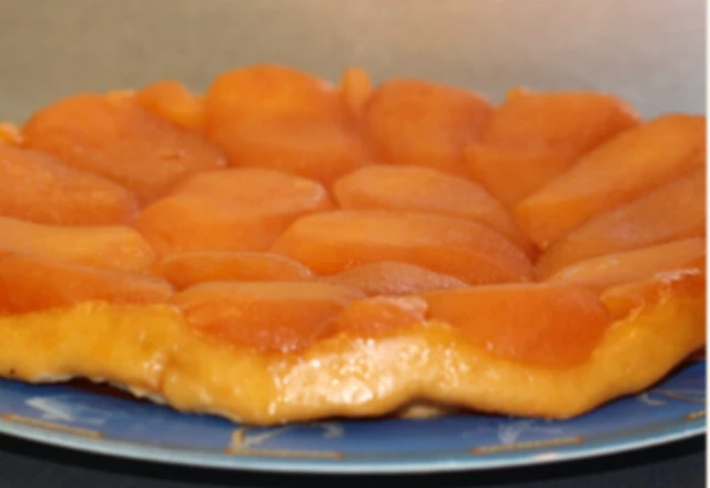 Golden homemade Tarte Tatin with caramelised fruit